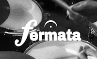 a black and white photo of a person playing drums with the word fermata